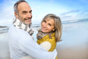 Portrait of loving senior couple at the beach
